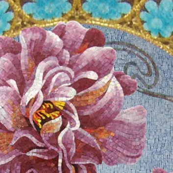 Green mosaic covering a bathroom, completing an elegant design.