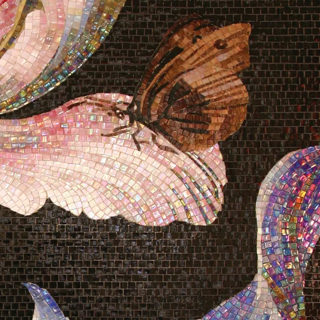 Green mosaic covering a bathroom, completing an elegant design.