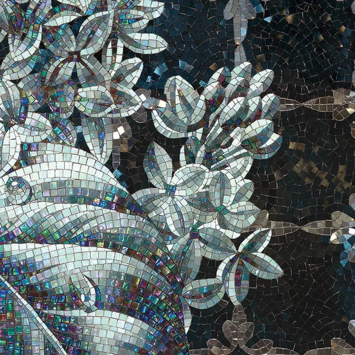 Green mosaic covering a bathroom, completing an elegant design.