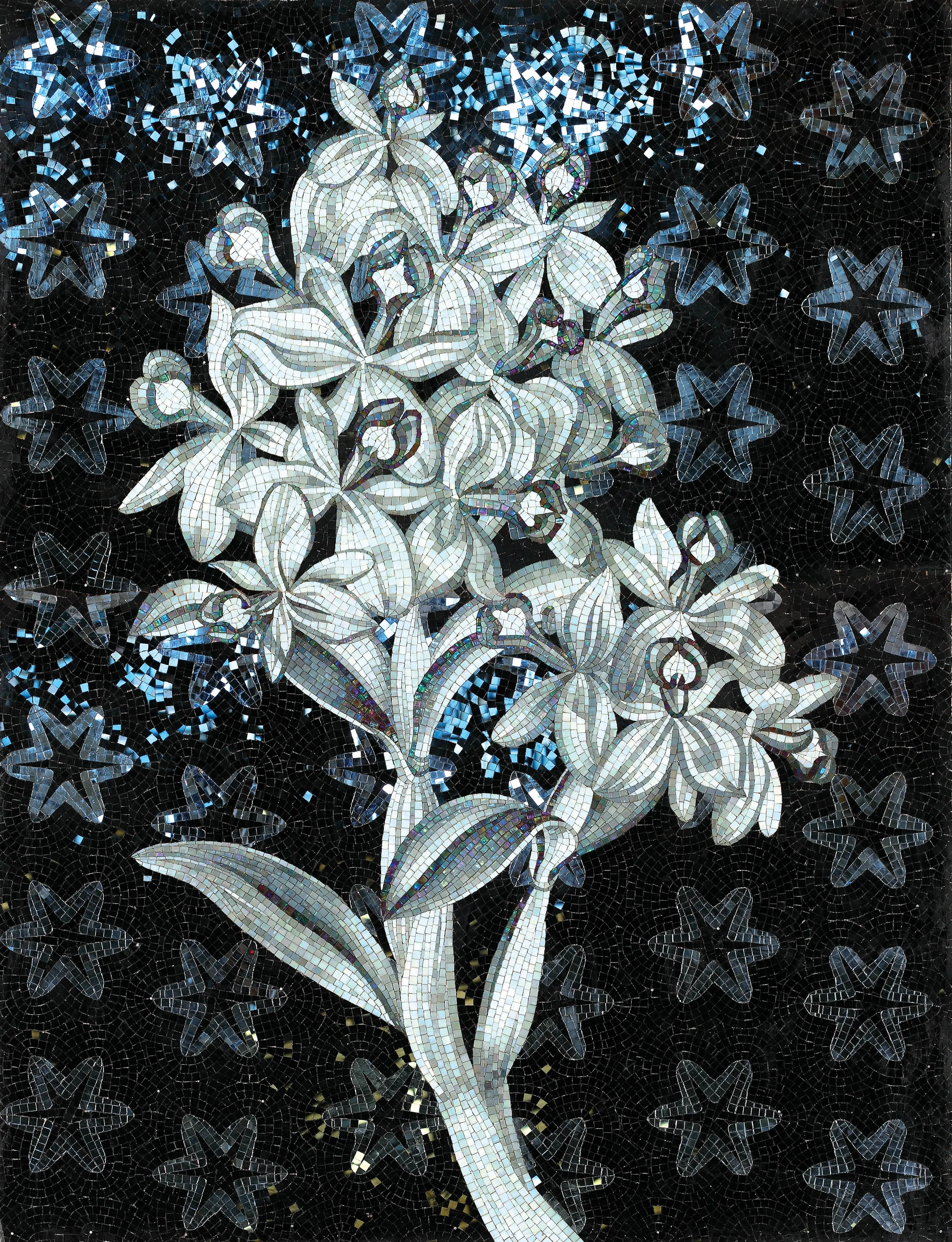 Green mosaic covering a bathroom, completing an elegant design.