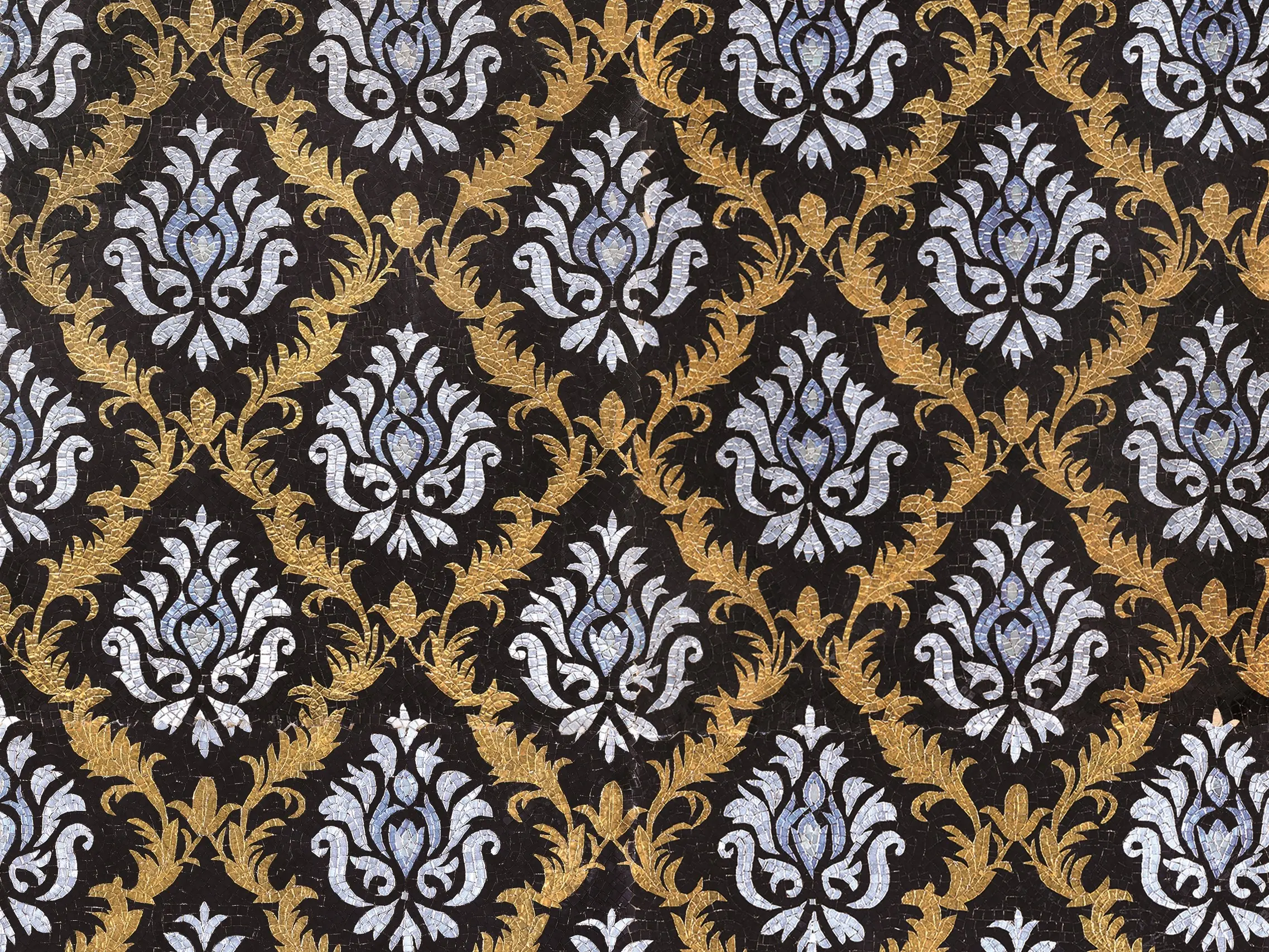 Green mosaic covering a bathroom, completing an elegant design.