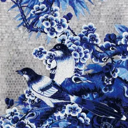 Green mosaic covering a bathroom, completing an elegant design.