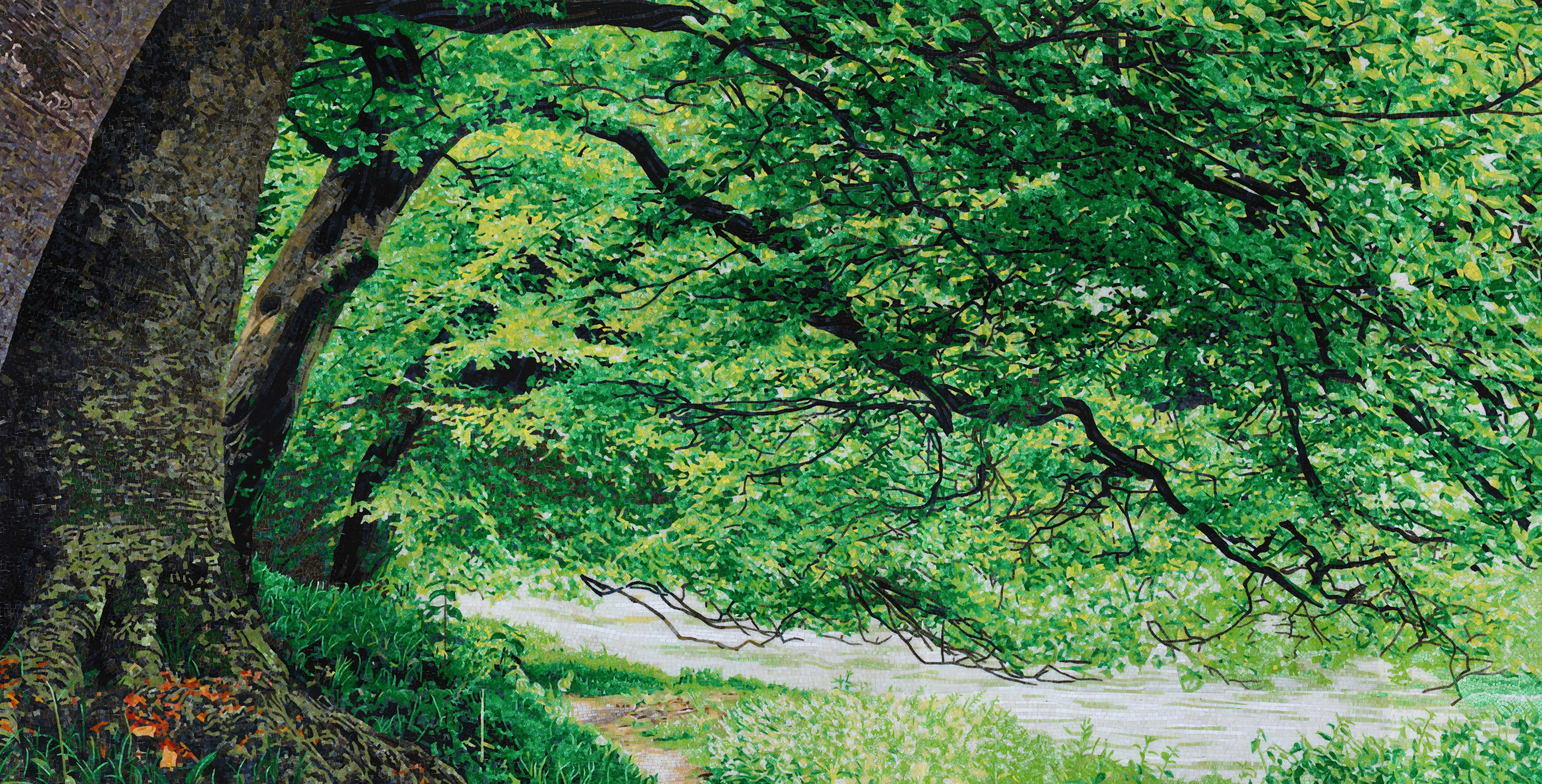 Green mosaic covering a bathroom, completing an elegant design.