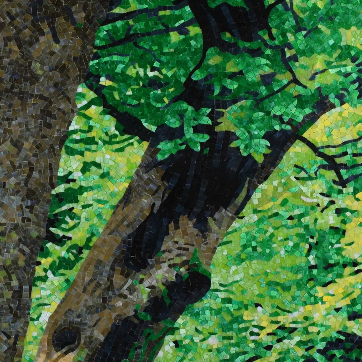 Green mosaic covering a bathroom, completing an elegant design.